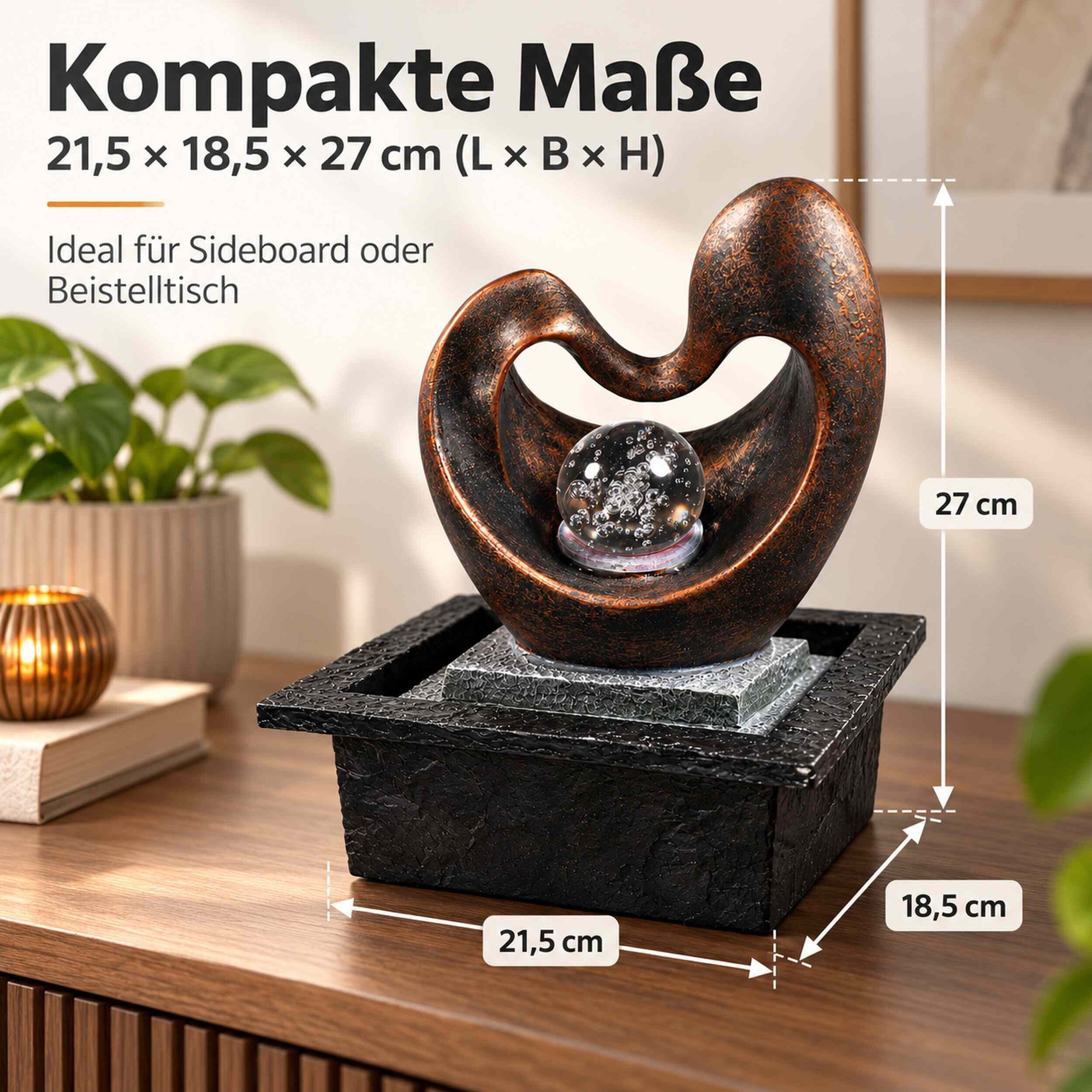Zimmerbrunnen Herzform mit rotierender Glaskugel Zimmerbrunnen in Herzform mit rotierender Glaskugel auf rechteckigem Sockel, daneben Maßangaben und eine Topfpflanze