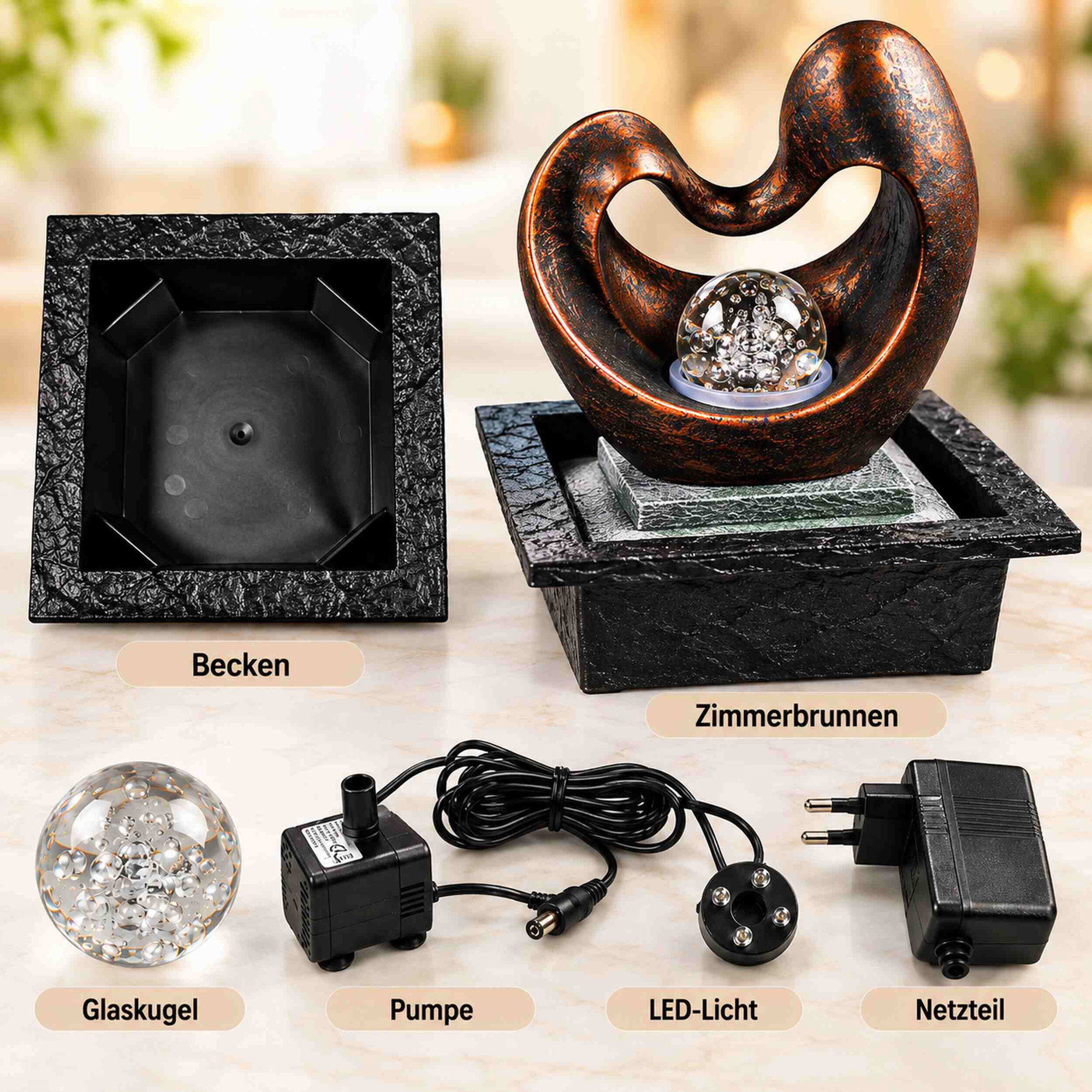 Zimmerbrunnen Herzform mit Glaskugel und LED Zimmerbrunnen in Herzform mit rotierender Glaskugel auf schwarzem Sockel, daneben abgebildet Becken, Glaskugel, Pumpe, LED-Licht und Netzteil.